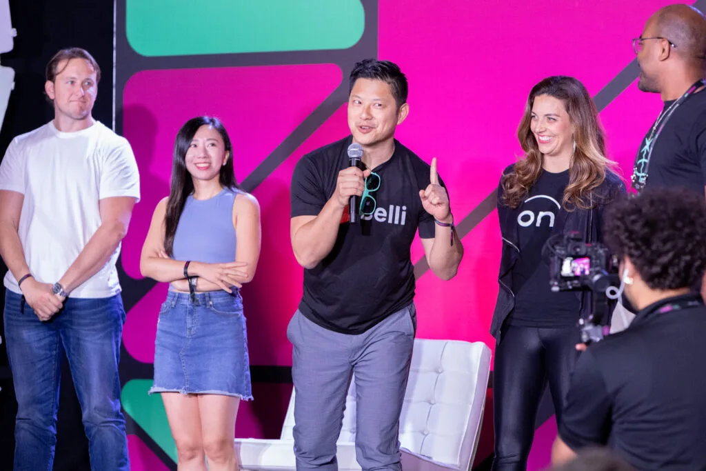 Belli founder Jeff Pan on stage at SaaStock USA global pitch competition.