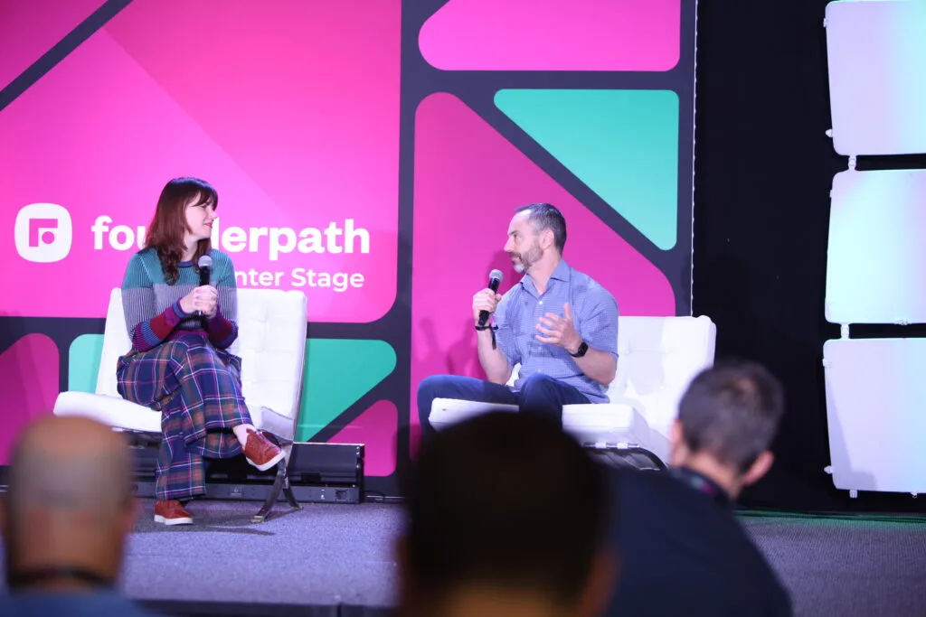 Jen Igartua and Keith Rabkin on stage at SaaStock USA