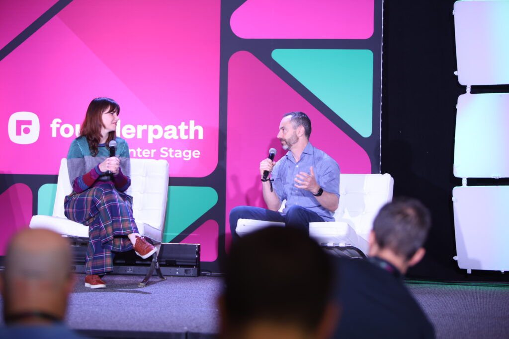 Jen Igartua and Keith Rabkin on stage at SaaStock USA