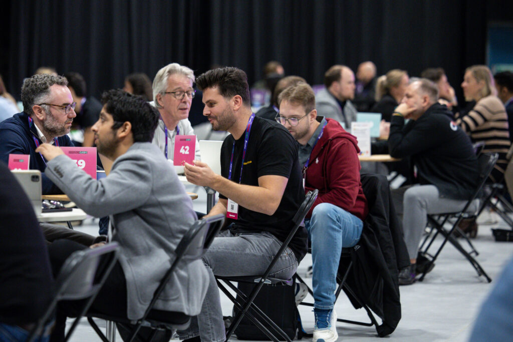 ElasticScale founder Alex Jeensma in a meeting at SaaStock Europe 2025